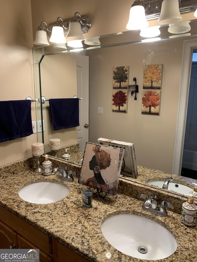 6279 Giles Rd, Lithonia, GA 30058 - full bathroom with double vanity