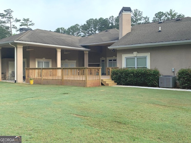 6279 Giles Rd, Lithonia, GA 30058 - view of front of property featuring a chimney, stucco siding, a front yard, and roof with shingles