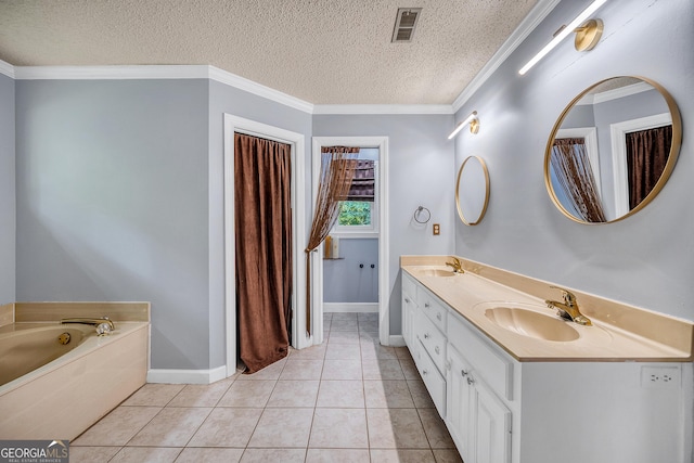 bathroom with a sink, double vanity, a textured ceiling, and visible vents