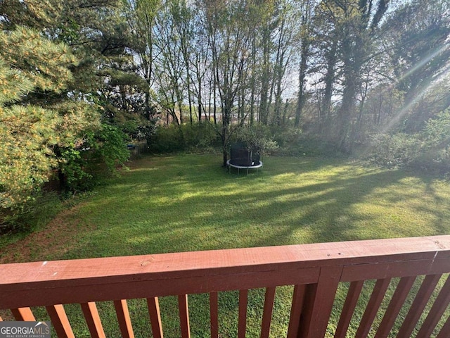 view of yard featuring a trampoline