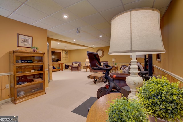 interior space featuring carpet floors, recessed lighting, and a paneled ceiling