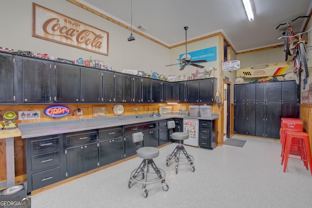 garage with visible vents and ceiling fan