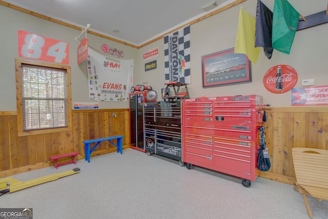 game room featuring visible vents, ornamental molding, wood walls, a wainscoted wall, and carpet flooring