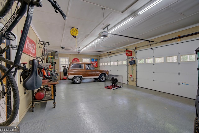 garage featuring a garage door opener