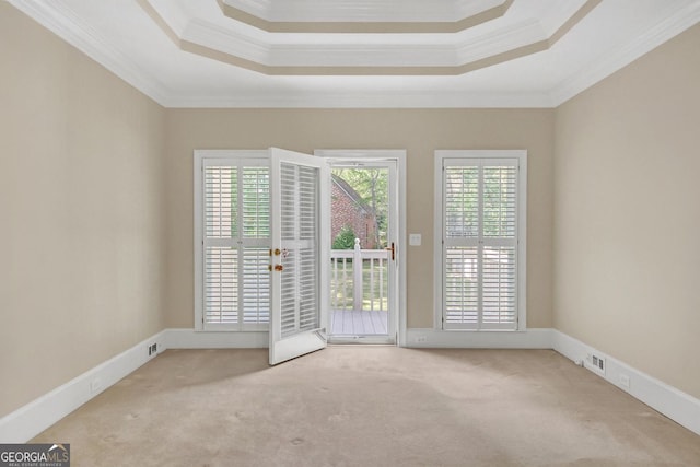 1405 Wilmington Way, Grayson, GA 30017 - carpeted spare room with crown molding and a tray ceiling