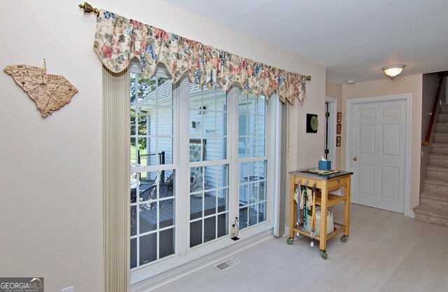 707 Tall Oak Trl, Seneca, SC 29678 - dining space featuring stairs, visible vents, and wood finished floors