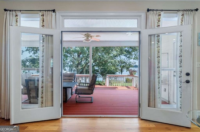 entryway with a ceiling fan and wood finished floors