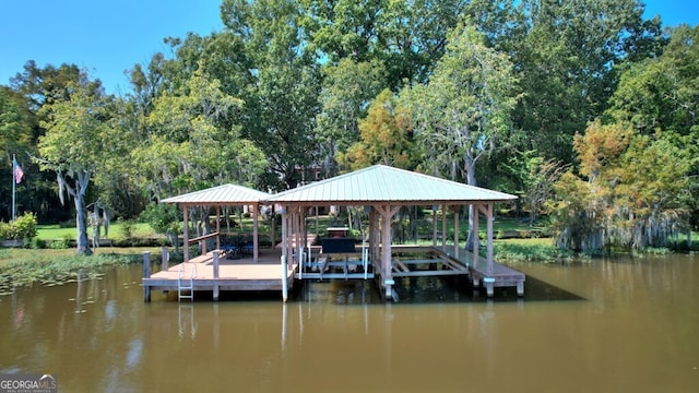 view of dock with a water view