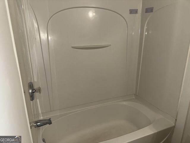 full bath featuring shower / washtub combination