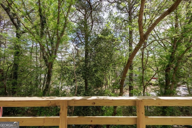 deck with a wooded view
