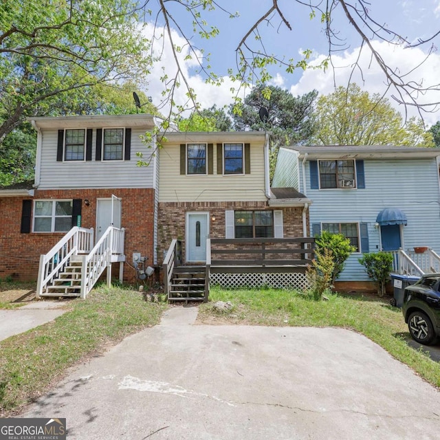 view of front of house featuring brick siding