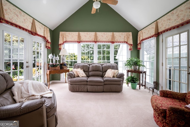 sunroom / solarium featuring french doors