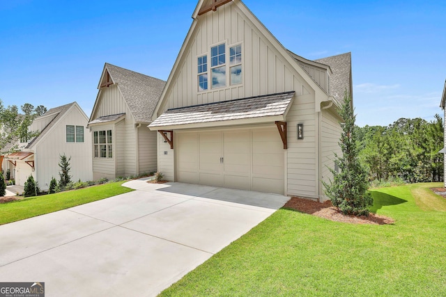 310 Arbor Garden Cir, Newnan, GA 30265 - view of front of property featuring board and batten siding, driveway, a front lawn, a garage, and a shingled roof