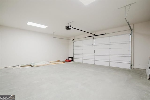 310 Arbor Garden Cir, Newnan, GA 30265 - garage featuring a garage door opener