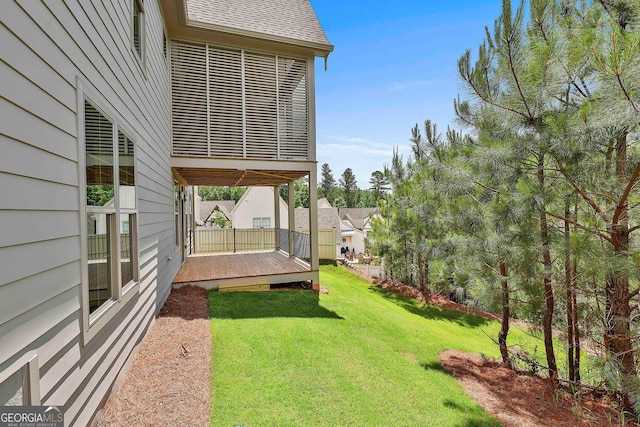 310 Arbor Garden Cir, Newnan, GA 30265 - view of grassy yard with a deck