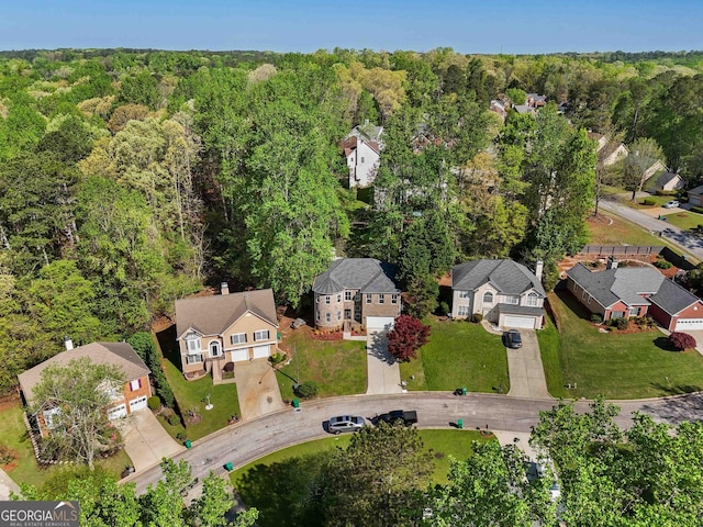 6960 Dockbridge Way, Stone Mountain, GA 30087 - aerial overview of property's location featuring nearby suburban area and a heavily wooded area