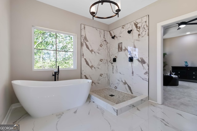 6960 Dockbridge Way, Stone Mountain, GA 30087 - full bath featuring a freestanding tub, a chandelier, marble finish floors, and a marble finish shower