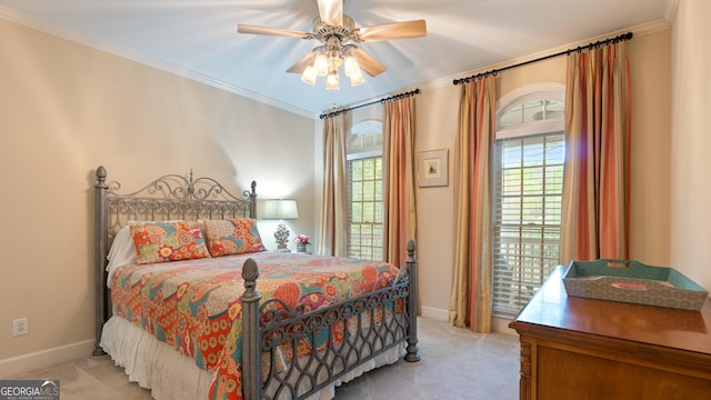 bedroom featuring carpet, baseboards, and crown molding
