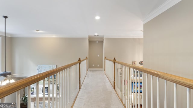hallway featuring ornamental molding, baseboards, and recessed lighting