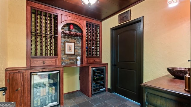 104 Kremer Falls Trce, Canton, GA 30114 - wine room featuring wine cooler, a textured wall, and a sink