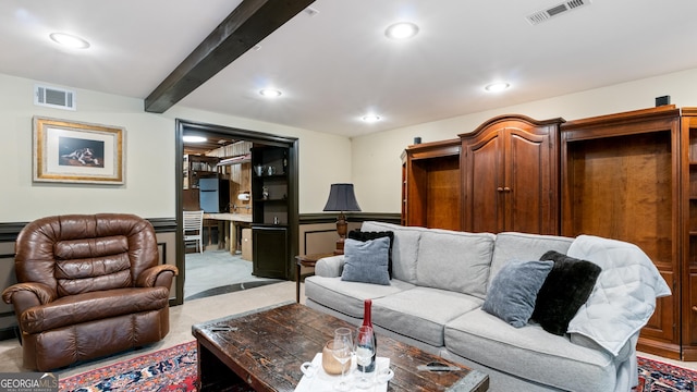 living area with visible vents, recessed lighting, and beamed ceiling