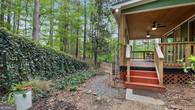 deck featuring fence and a ceiling fan