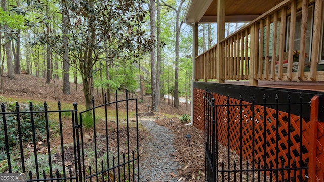 view of gate featuring fence