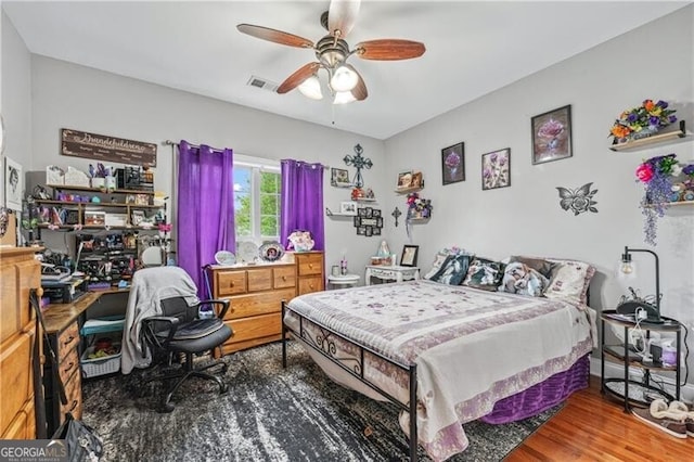 698 Jefferson Hwy, Winder, GA 30680 - bedroom featuring wood finished floors and ceiling fan