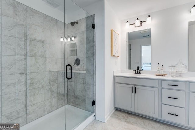 full bathroom featuring ensuite bath, a shower stall, marble finish floor, and vanity