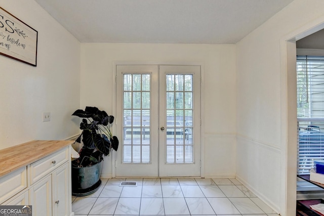 6040 Carriage Dr, Cumming, GA 30028 - doorway to outside with french doors, visible vents, and a healthy amount of sunlight