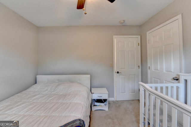 6040 Carriage Dr, Cumming, GA 30028 - carpeted bedroom with a ceiling fan