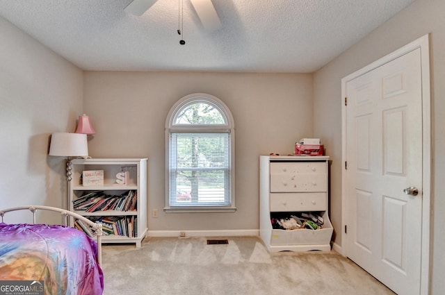 6040 Carriage Dr, Cumming, GA 30028 - bedroom with visible vents, baseboards, carpet flooring, and a textured ceiling