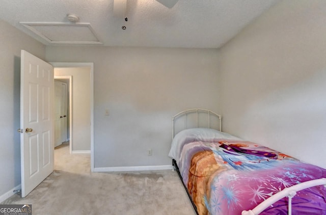 6040 Carriage Dr, Cumming, GA 30028 - bedroom with a textured ceiling, a ceiling fan, attic access, carpet flooring, and baseboards