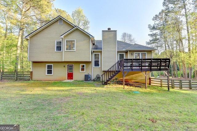 6040 Carriage Dr, Cumming, GA 30028 - rear view of property with central air condition unit, a chimney, stairs, fence, and a lawn