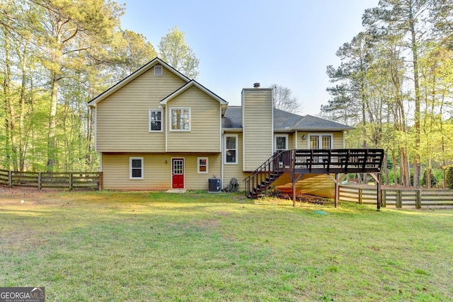 6040 Carriage Dr, Cumming, GA 30028 - rear view of property featuring a yard, a chimney, fence, stairway, and a wooden deck