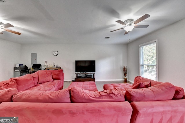 6040 Carriage Dr, Cumming, GA 30028 - living room featuring visible vents, baseboards, a ceiling fan, and wood finished floors