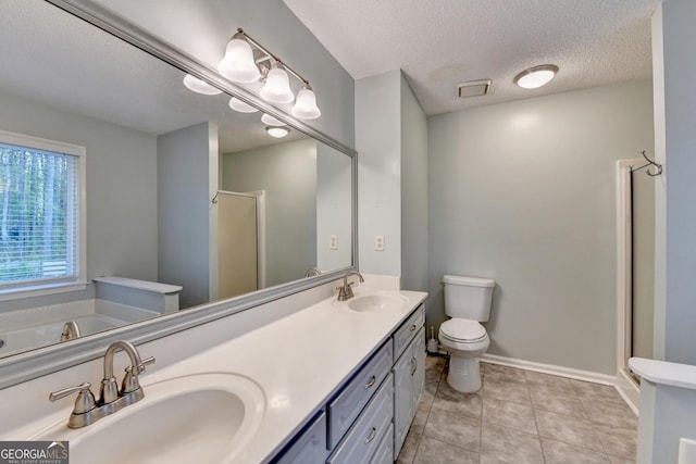 6040 Carriage Dr, Cumming, GA 30028 - full bath with double vanity, a stall shower, tile patterned floors, a bath, and a sink
