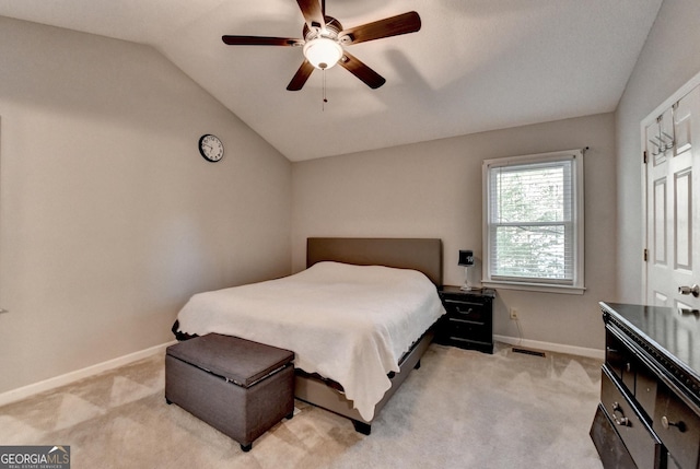 6040 Carriage Dr, Cumming, GA 30028 - bedroom with visible vents, light colored carpet, baseboards, and lofted ceiling