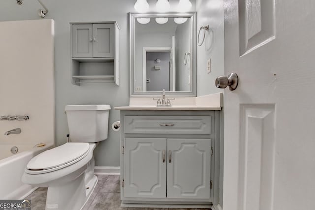 6040 Carriage Dr, Cumming, GA 30028 - full bath with toilet, vanity, baseboards, and  shower combination
