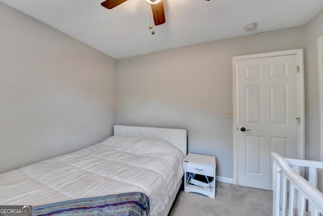 6040 Carriage Dr, Cumming, GA 30028 - bedroom with a ceiling fan and carpet floors