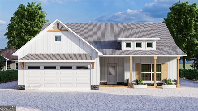 modern inspired farmhouse with board and batten siding, driveway, covered porch, and a garage