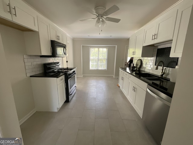 kitchen featuring gas stove, tasteful backsplash, black microwave, and dishwasher