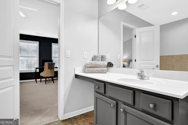 6330 Elmshorn Way, Alpharetta, GA 30004 - bathroom featuring visible vents, vanity, ensuite bath, and baseboards