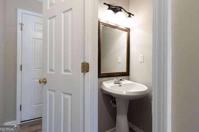 bathroom with wood finished floors