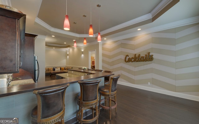 5224 Brendlynn Dr, Suwanee, GA 30024 - bar featuring a raised ceiling, a sink, dark wood finished floors, recessed lighting, and pendant lighting