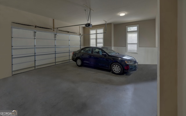 5224 Brendlynn Dr, Suwanee, GA 30024 - garage featuring a garage door opener