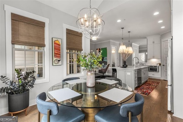 111 Brighton Blvd, Woodstock, GA 30188 - dining room featuring a chandelier, recessed lighting, dark wood-style flooring, and baseboards