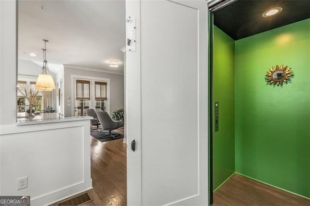 111 Brighton Blvd, Woodstock, GA 30188 - corridor with wood finished floors, recessed lighting, visible vents, and elevator