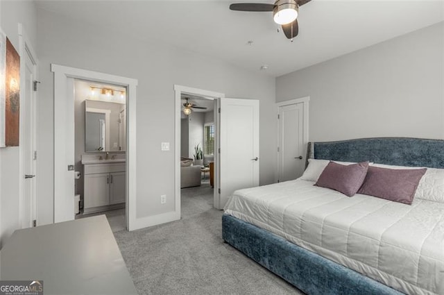 111 Brighton Blvd, Woodstock, GA 30188 - bedroom with baseboards, ensuite bath, a ceiling fan, carpet, and a sink