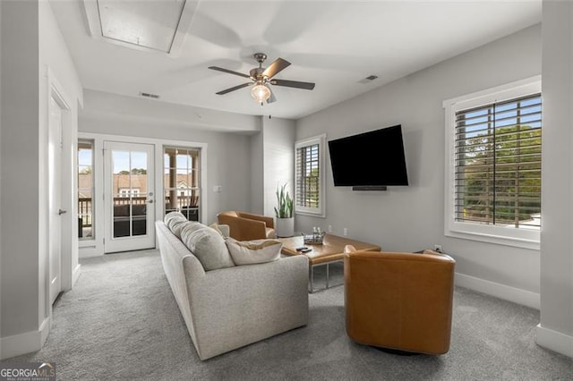 111 Brighton Blvd, Woodstock, GA 30188 - carpeted living area with a ceiling fan, visible vents, attic access, french doors, and baseboards